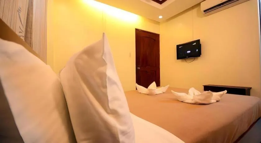 Bed in Ipil Suites El Nido