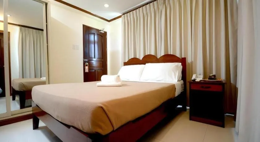 Bed in Ipil Suites El Nido