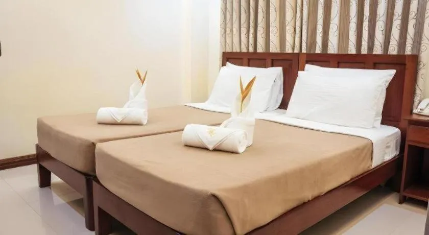 Bed in Ipil Suites El Nido