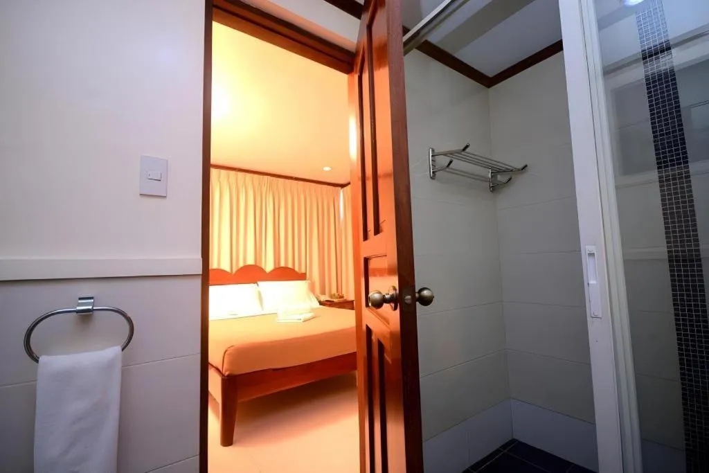 Bed in Ipil Suites El Nido