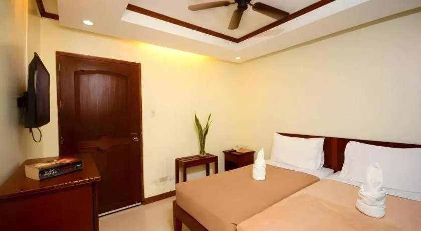 Bed in Ipil Suites El Nido