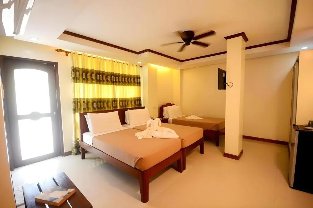 Bed in Ipil Suites El Nido