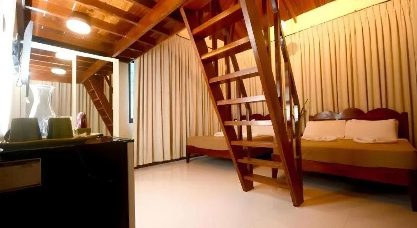 Bed in Ipil Suites El Nido