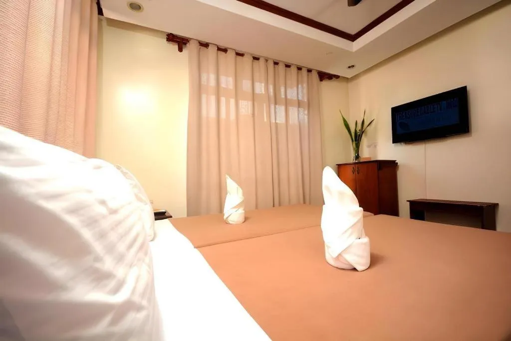 Bed in Ipil Suites El Nido