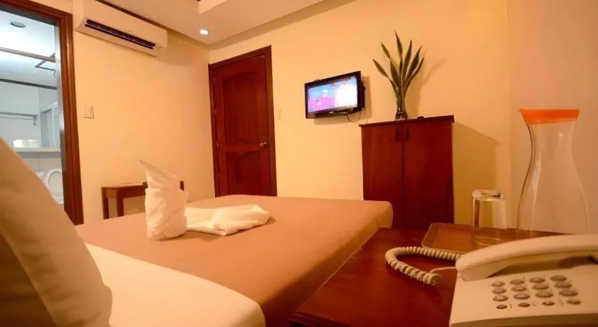 Bed in Ipil Suites El Nido