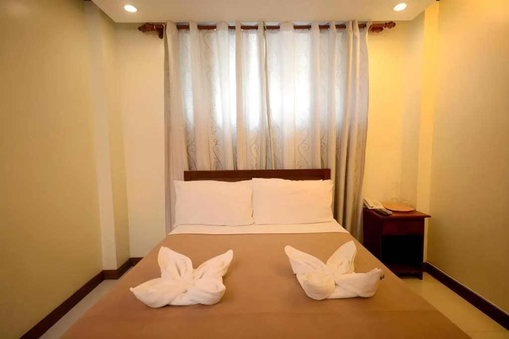 Bed in Ipil Suites El Nido