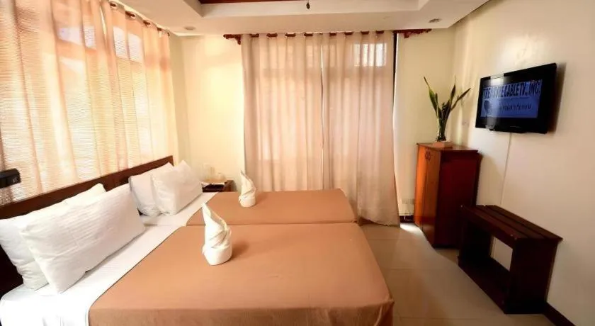 Bed in Ipil Suites El Nido