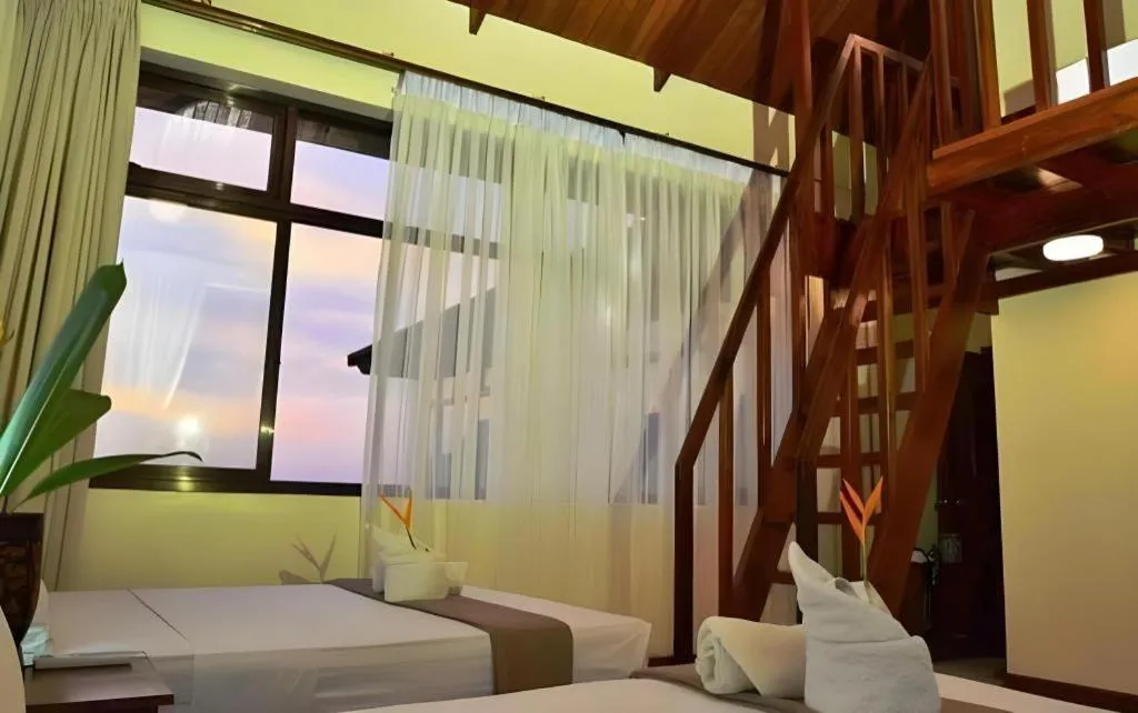 Bed in Ipil Suites El Nido
