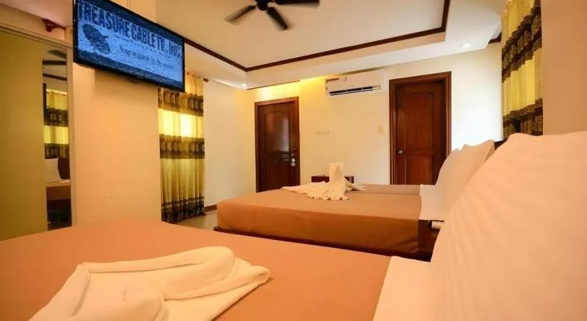 Bed in Ipil Suites El Nido