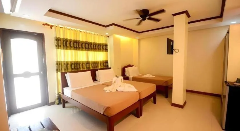 Bed in Ipil Suites El Nido