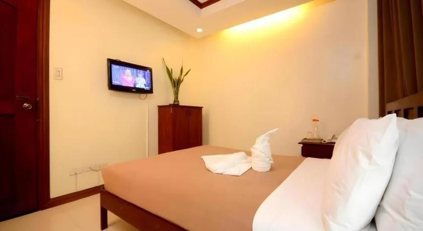 Bed in Ipil Suites El Nido