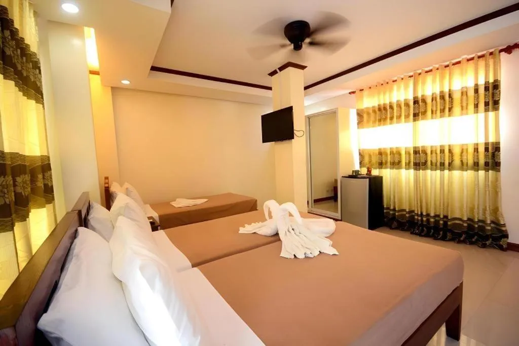 Bed in Ipil Suites El Nido