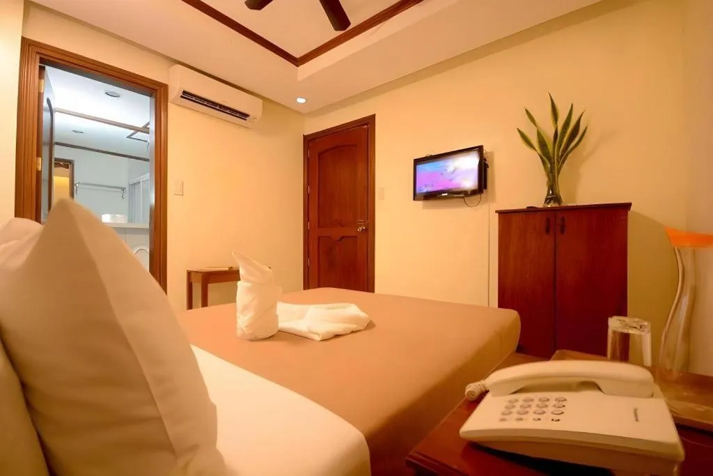 Bed in Ipil Suites El Nido