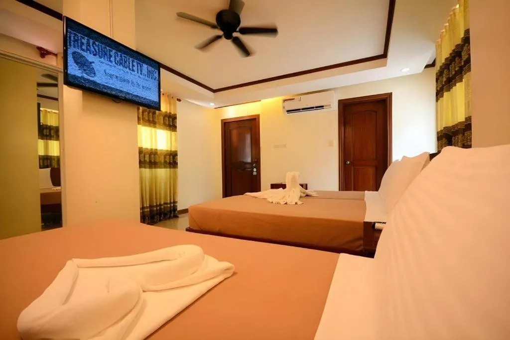 Bed in Ipil Suites El Nido