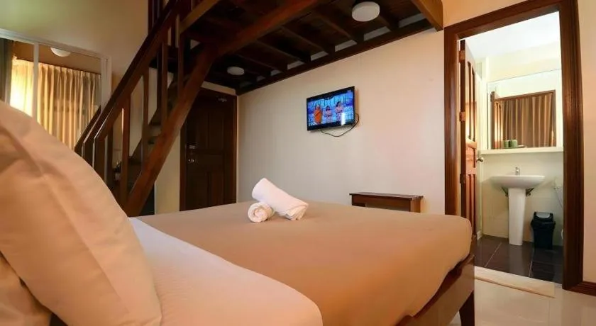 Bed in Ipil Suites El Nido