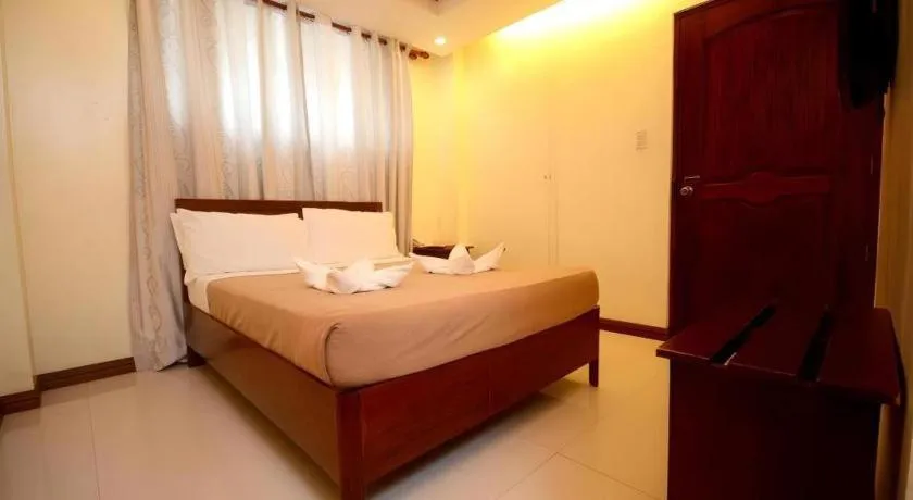 Bed in Ipil Suites El Nido