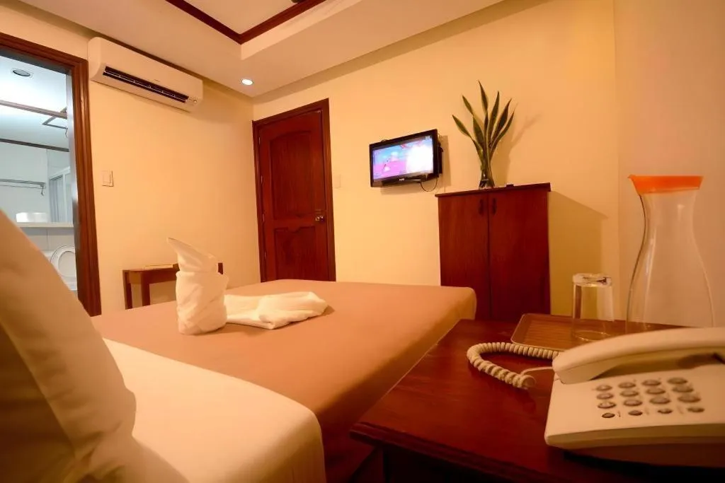 Bed in Ipil Suites El Nido
