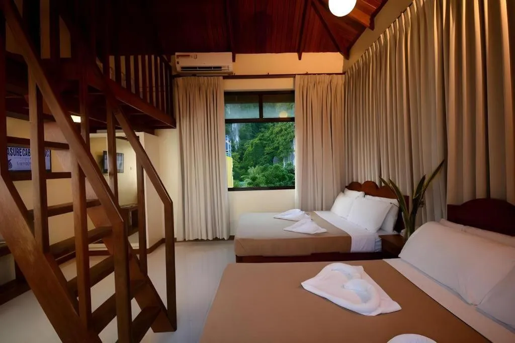 Bed in Ipil Suites El Nido