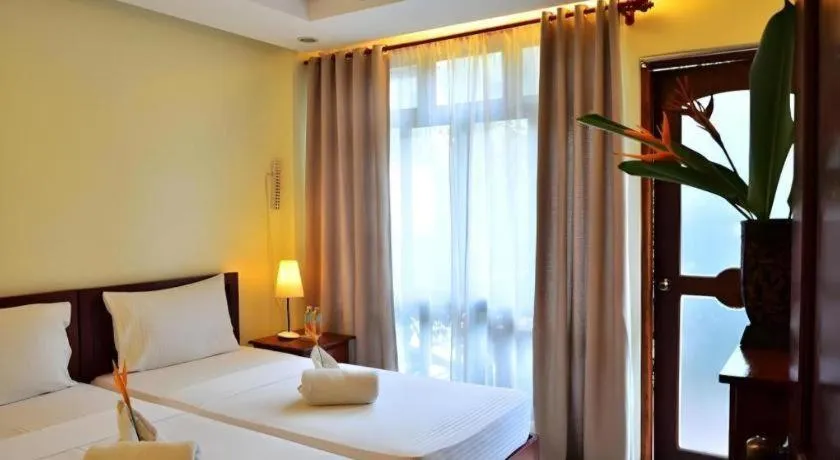 Bed in Ipil Suites El Nido