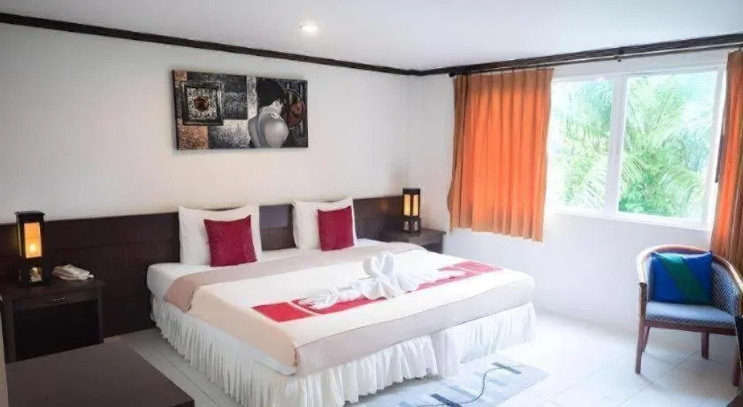 Bed in The Nice Patong Hotel