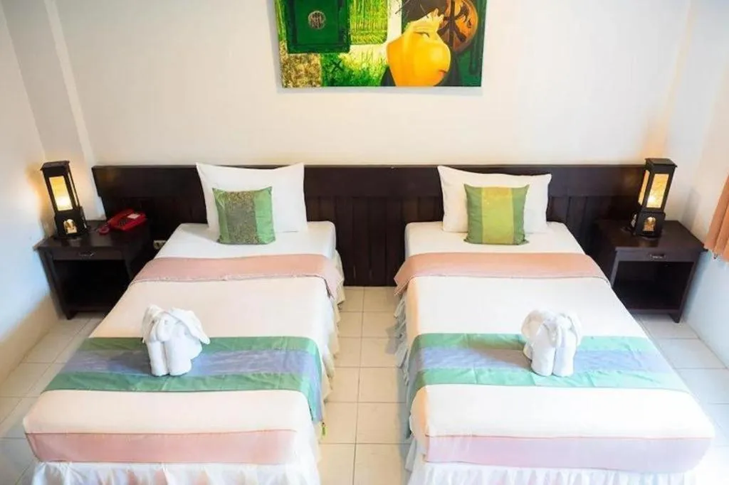 Bed in The Nice Patong Hotel