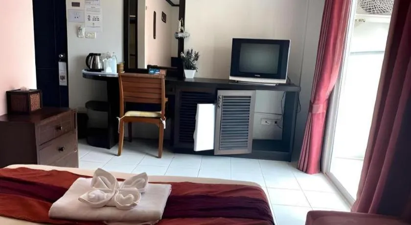 Bed in The Nice Patong Hotel