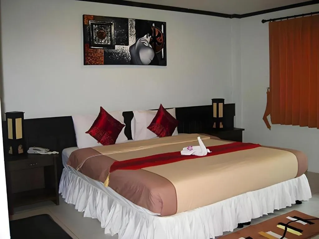 Bed in The Nice Patong Hotel