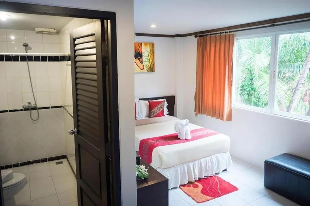 Bed in The Nice Patong Hotel