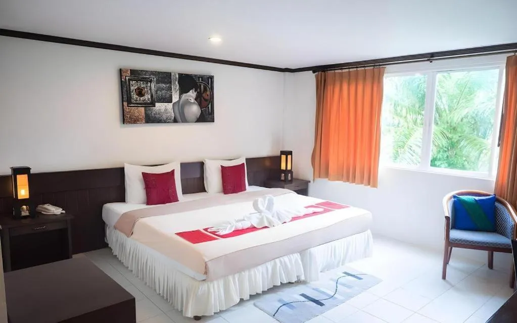 Bed in The Nice Patong Hotel