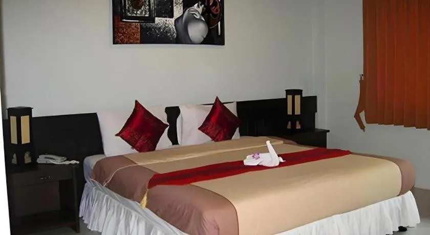 Bed in The Nice Patong Hotel