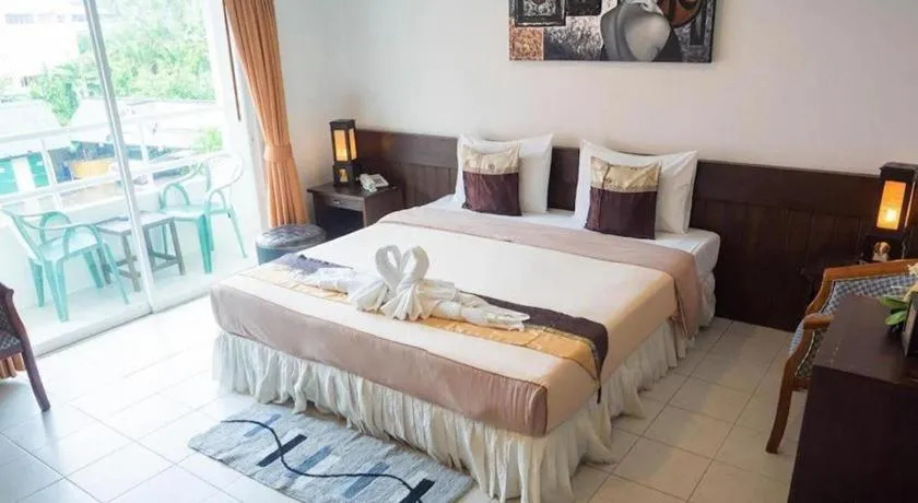 Bed in The Nice Patong Hotel