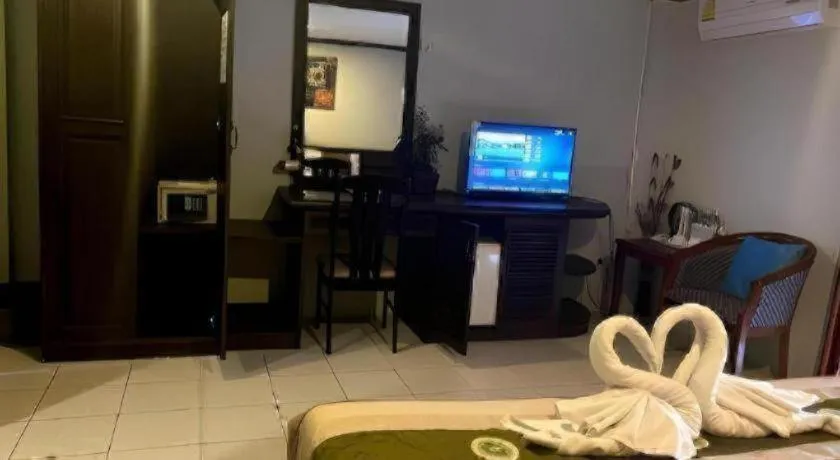 Bed in The Nice Patong Hotel