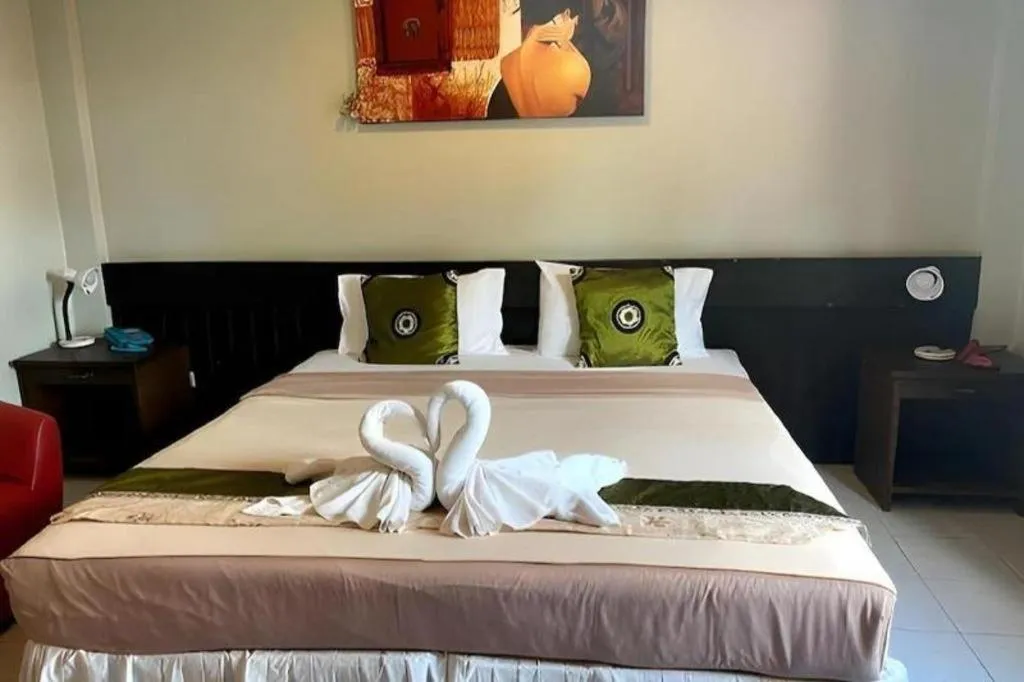 Bed in The Nice Patong Hotel
