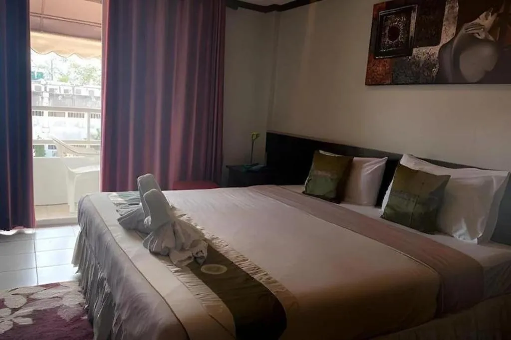 Bed in The Nice Patong Hotel