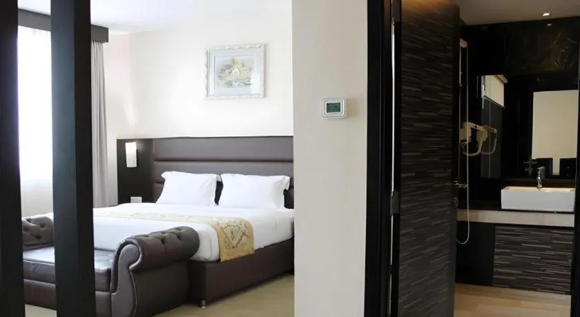 Bed in The BCC Hotel & Residence