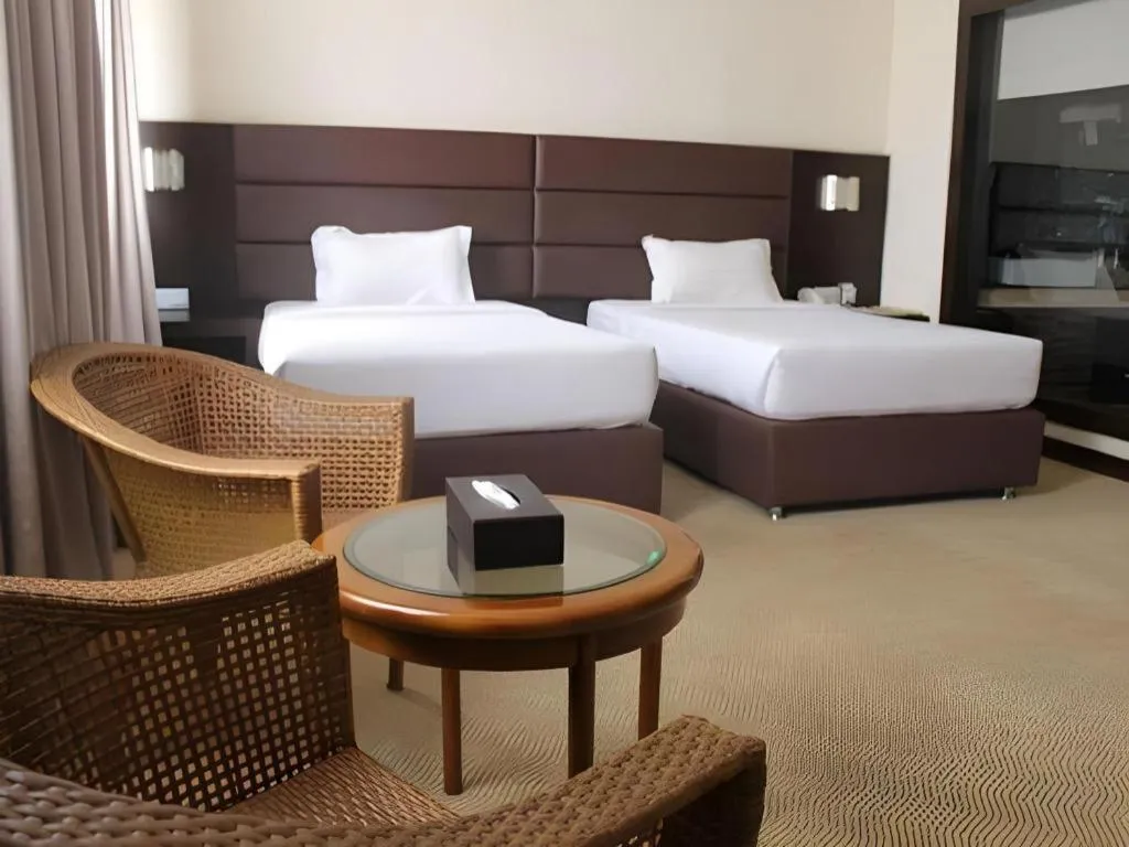 Bed in The BCC Hotel & Residence