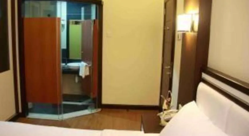 Bed in The BCC Hotel & Residence