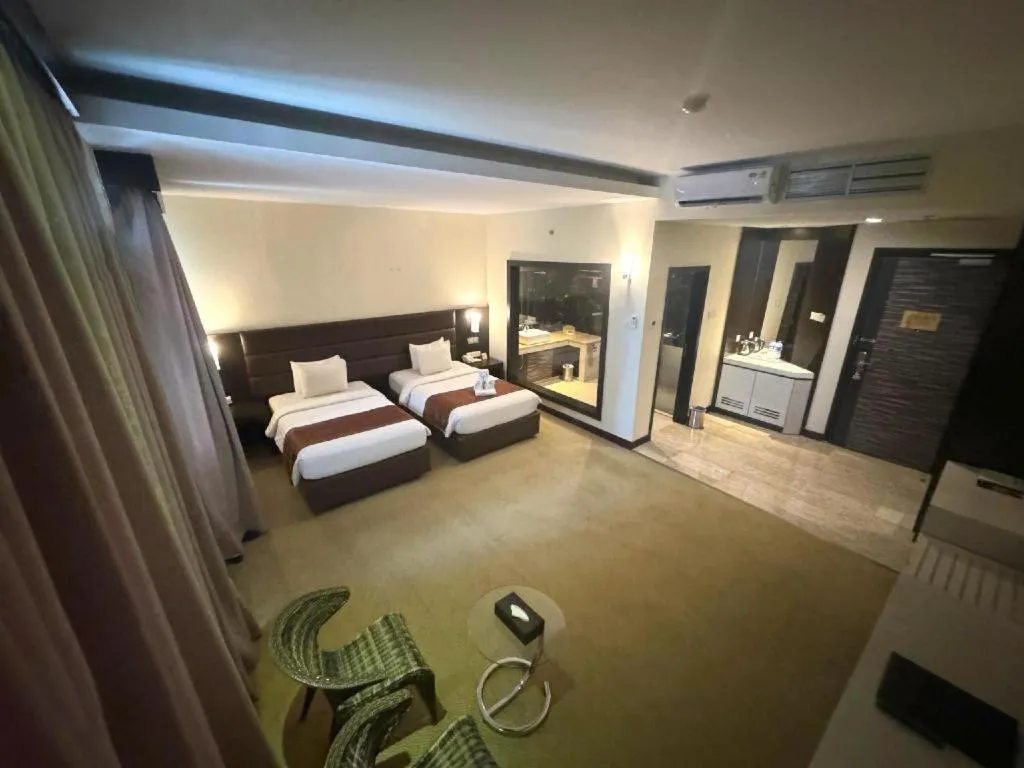 Bed in The BCC Hotel & Residence