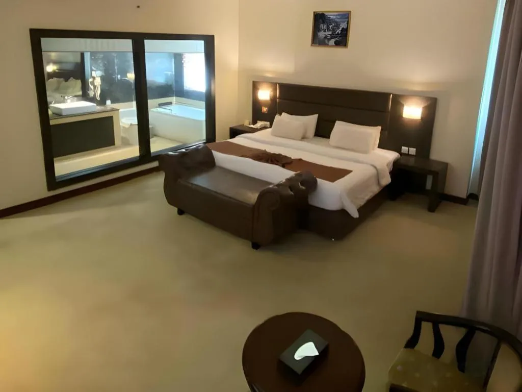 Bed in The BCC Hotel & Residence