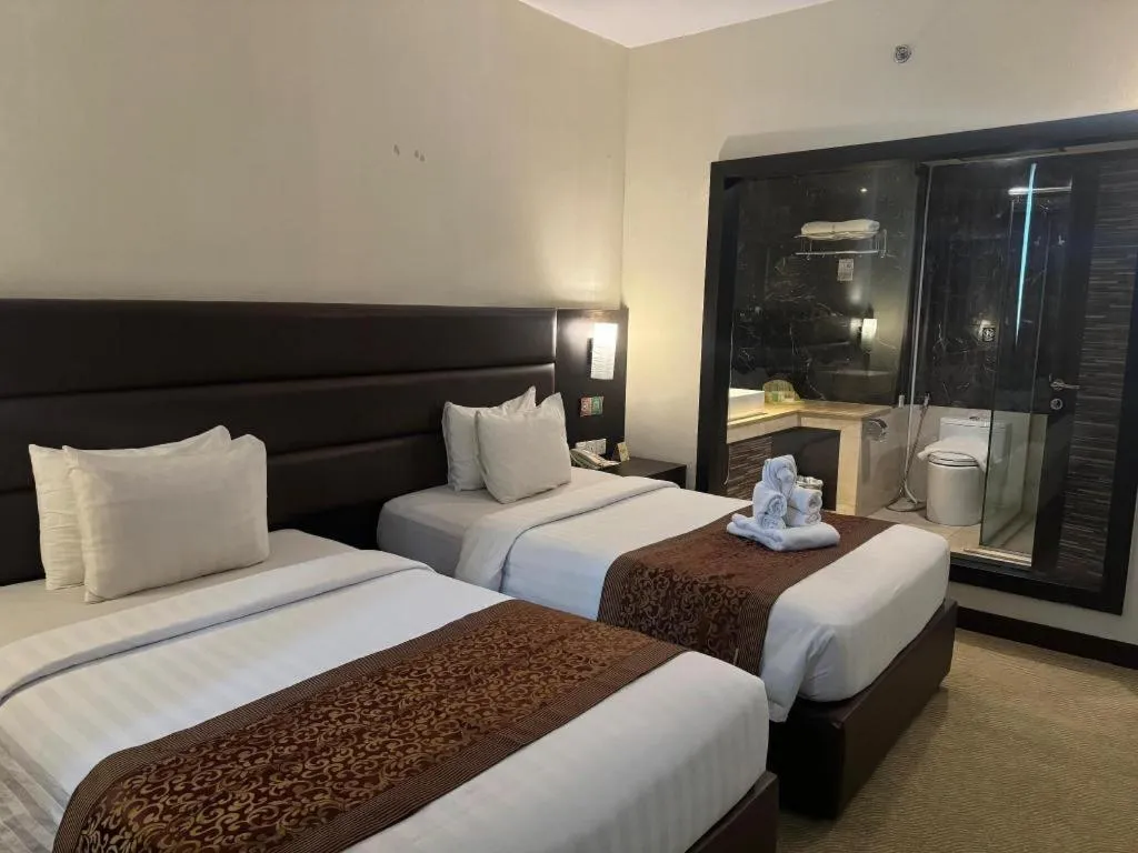 Bed in The BCC Hotel & Residence