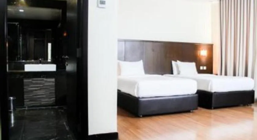 Bed in The BCC Hotel & Residence