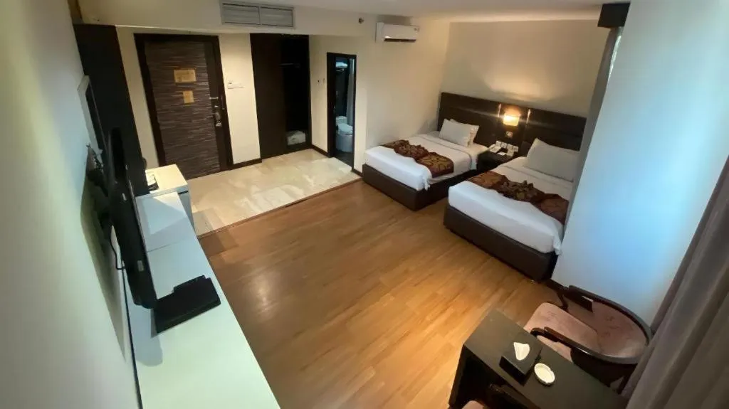 Bed in The BCC Hotel & Residence