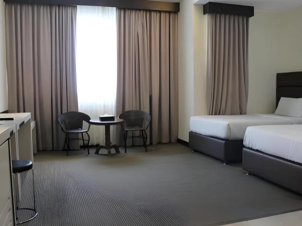 Bed in The BCC Hotel & Residence