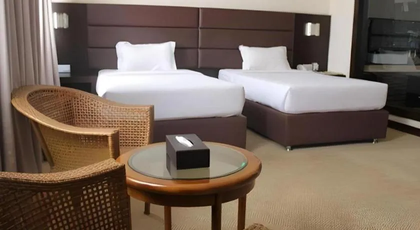 Bed in The BCC Hotel & Residence