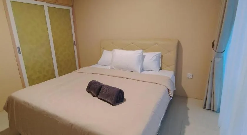 Bed in The BCC Hotel & Residence