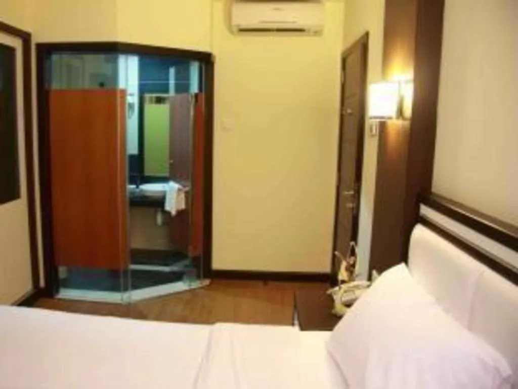 Bed in The BCC Hotel & Residence