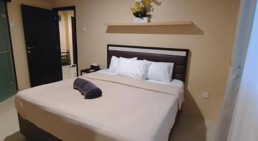 Bed in The BCC Hotel & Residence