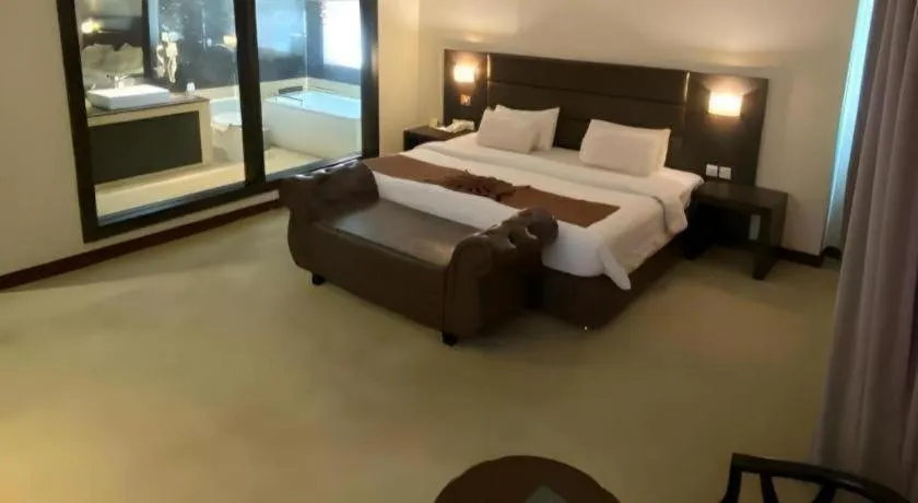Bed in The BCC Hotel & Residence