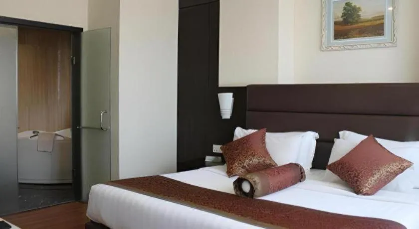 Bed in The BCC Hotel & Residence