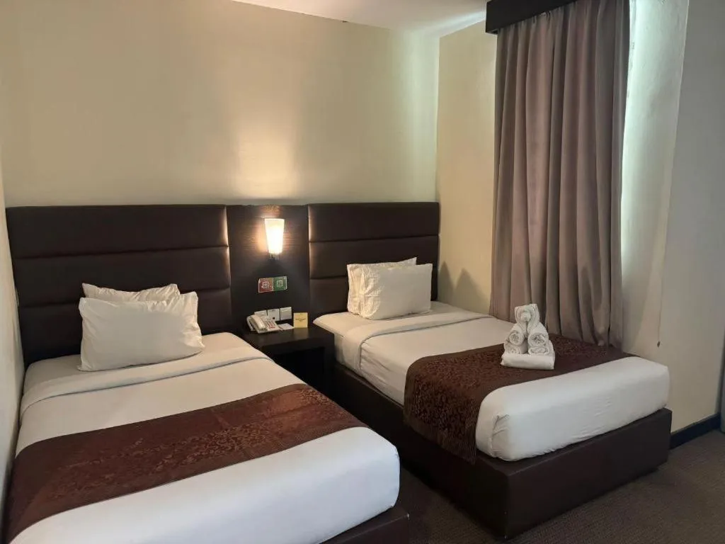 Bed in The BCC Hotel & Residence